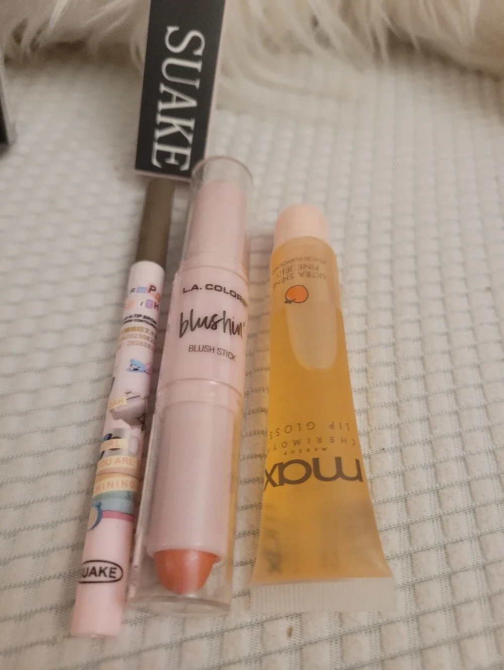 L.A. Colors Blushin' Stick, Lip Gloss, And Eyebrow Pen